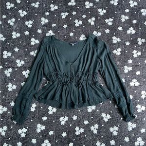 Green ruffle blouse